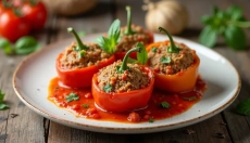 Odkrijte čarobnost polnjenih paprik z mletim mesom, pečenih v pečici