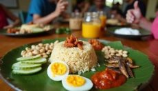 Odkrijte nasi lemak in njegovo bogato zgodovino ter tradicijo
